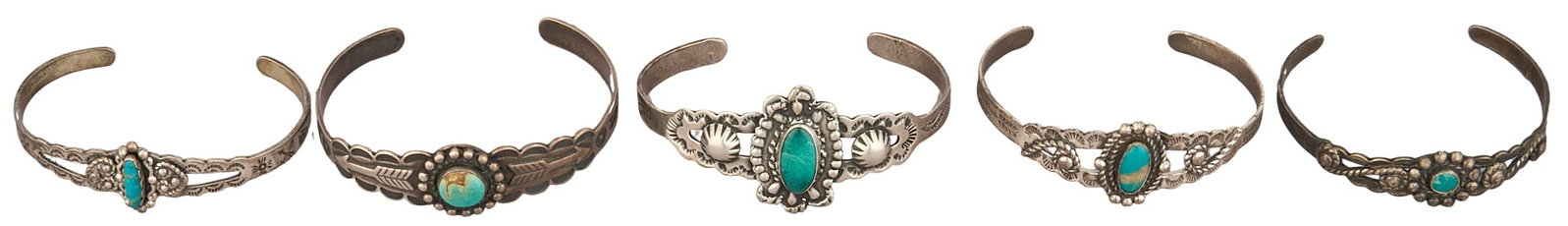 (5) Harvey-Era Turquoise Cuffs: Five Harvey-era sterling silver cuff bracelets, set with turquoise cabochons and stamped details, circa WWII, marked "Sterling" Circumference: 6 in. / each Total weight: 54.6 g