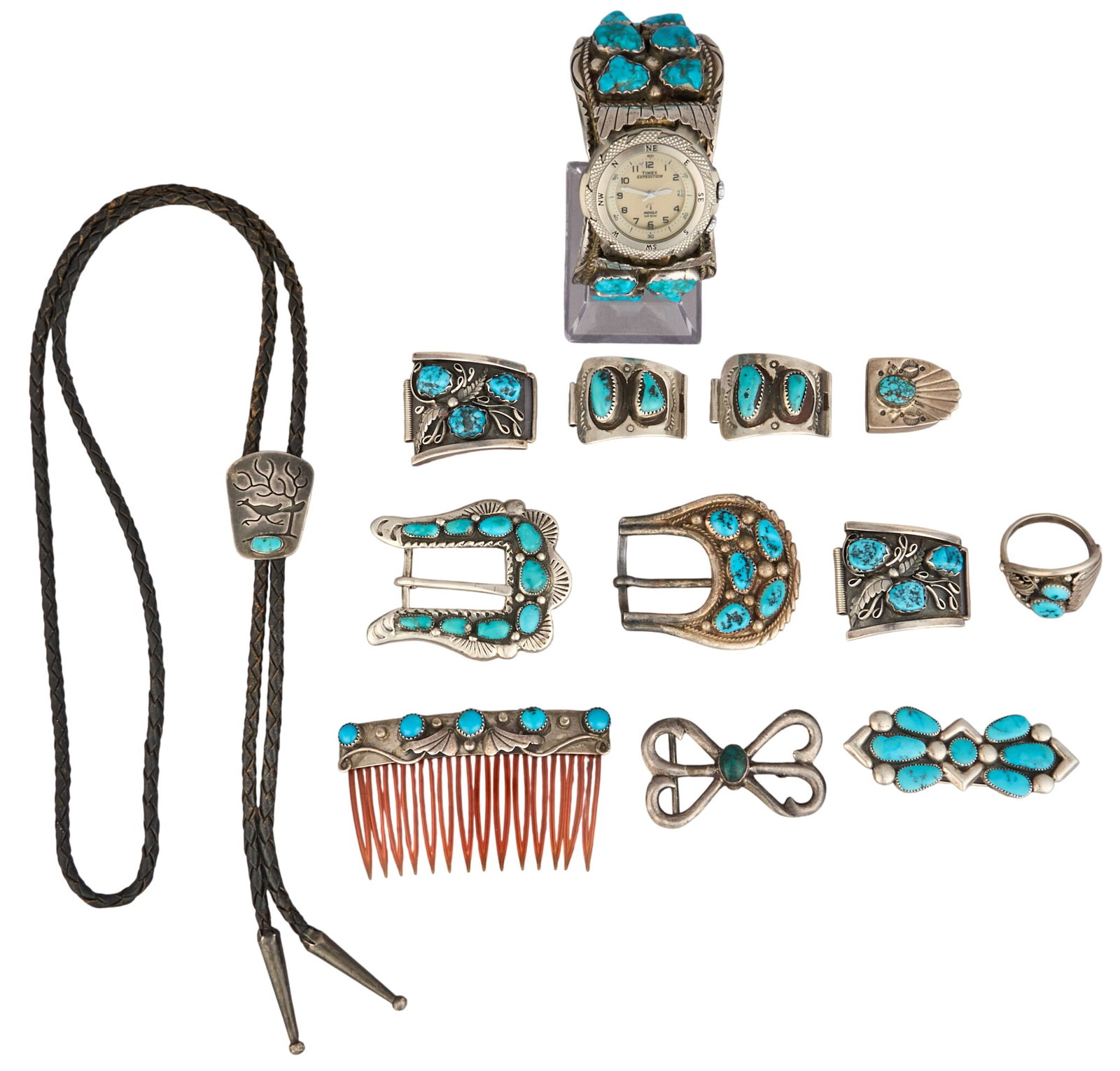 Collection of Turquoise Accessories: Collection of sterling silver and turquoise accessories and jewelry to include a hair comb, watch, two pairs of watch bands, three buckles, brooch, belt tip, ring, and bolo tie, several mark