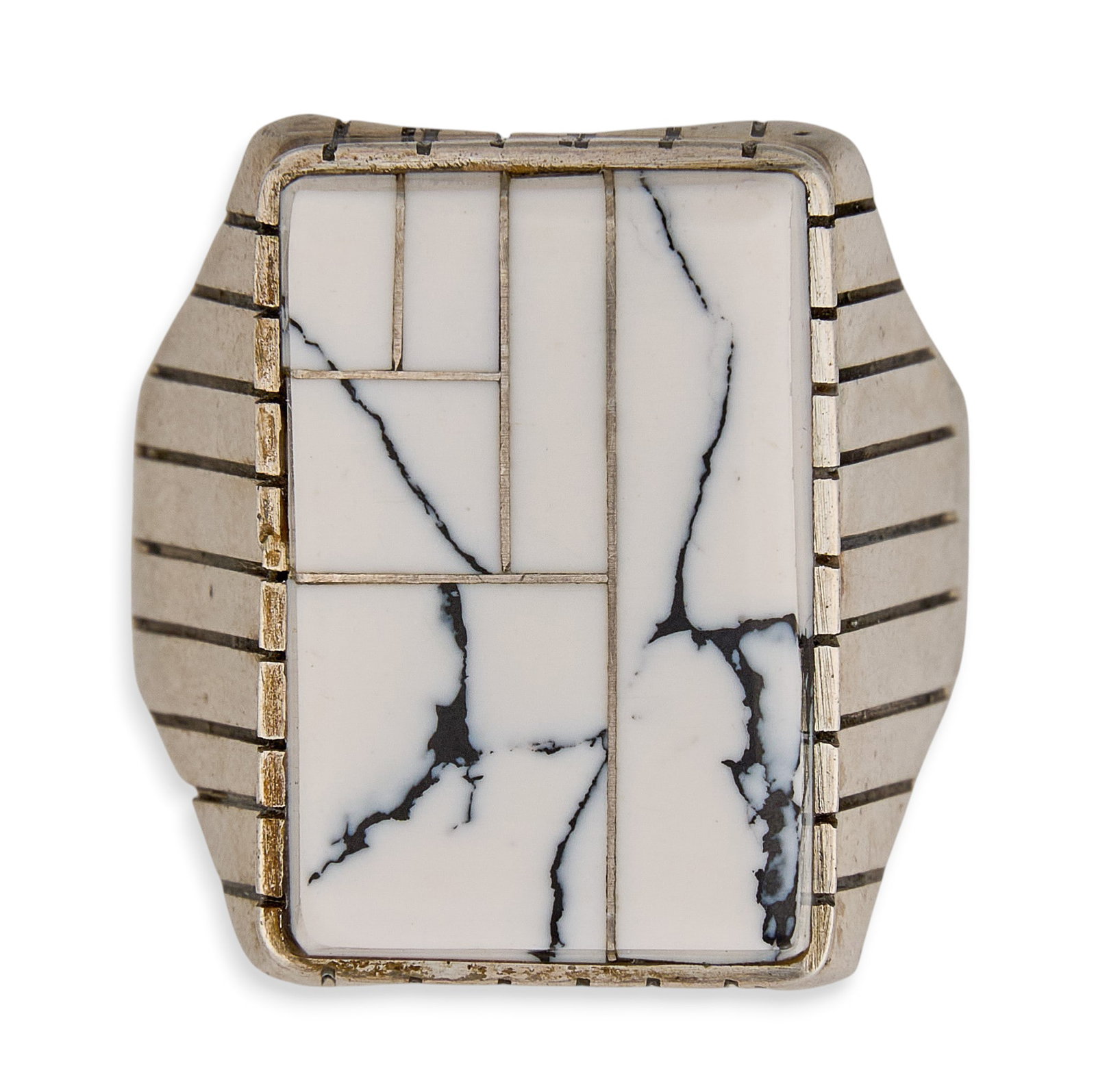 Men's Sterling Silver & White Buffalo Ring: Men's sterling silver ring, set with white buffalo inlay in geometric design, marked illegibly Size: 13 Total weight: 20.6 g Provenance: Property from a home in San Antonio, Texas