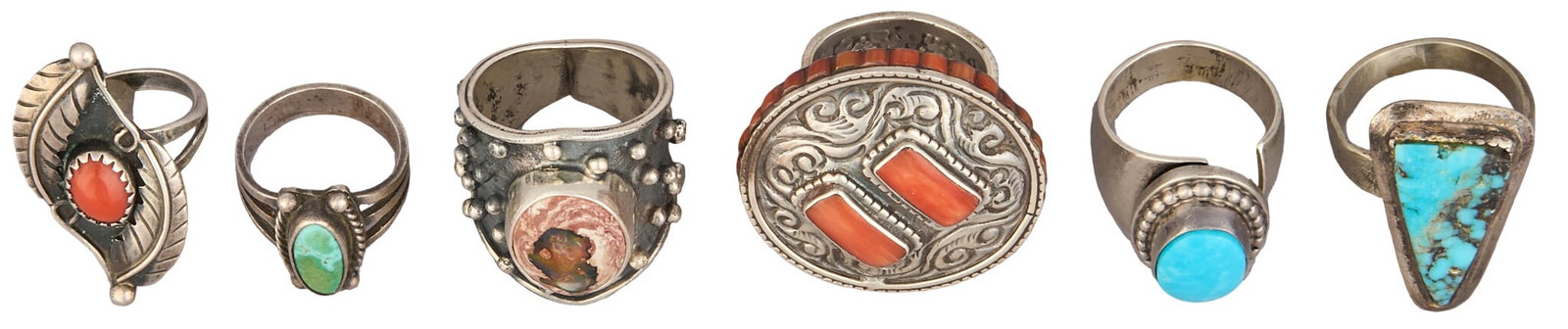 (6) Sterling & Multi-Stone Rings: Six sterling silver rings, set with various gemstone cabochons and inlay, featuring feather motifs and stamped details, marked Sizes: 5-8.5 Total weight: 58.7 g Provenance: Property from a home i