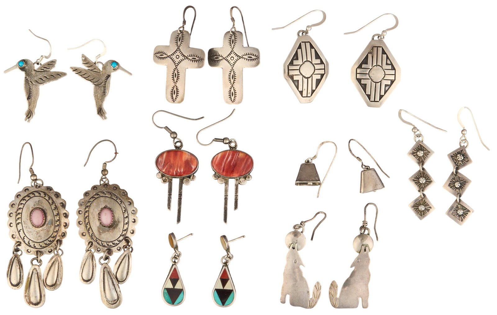 (9) Pairs of Native American Earrings: Nine pairs of Native American sterling silver earrings, set with various stone inlay, featuring hummingbird, cross, wolf, and concho motifs, several pairs marked "Sterling", including exampl