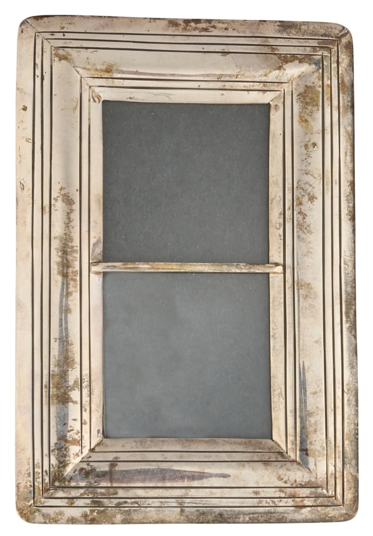 Navajo Made Sterling Silver Frame: Leonard and Marion Nez, Navajo made sterling silver picture frame, marked "Sterling L.M. Nez" Frame: 6 in. x 4 in. Provenance: Property from an Austin, Texas estate
