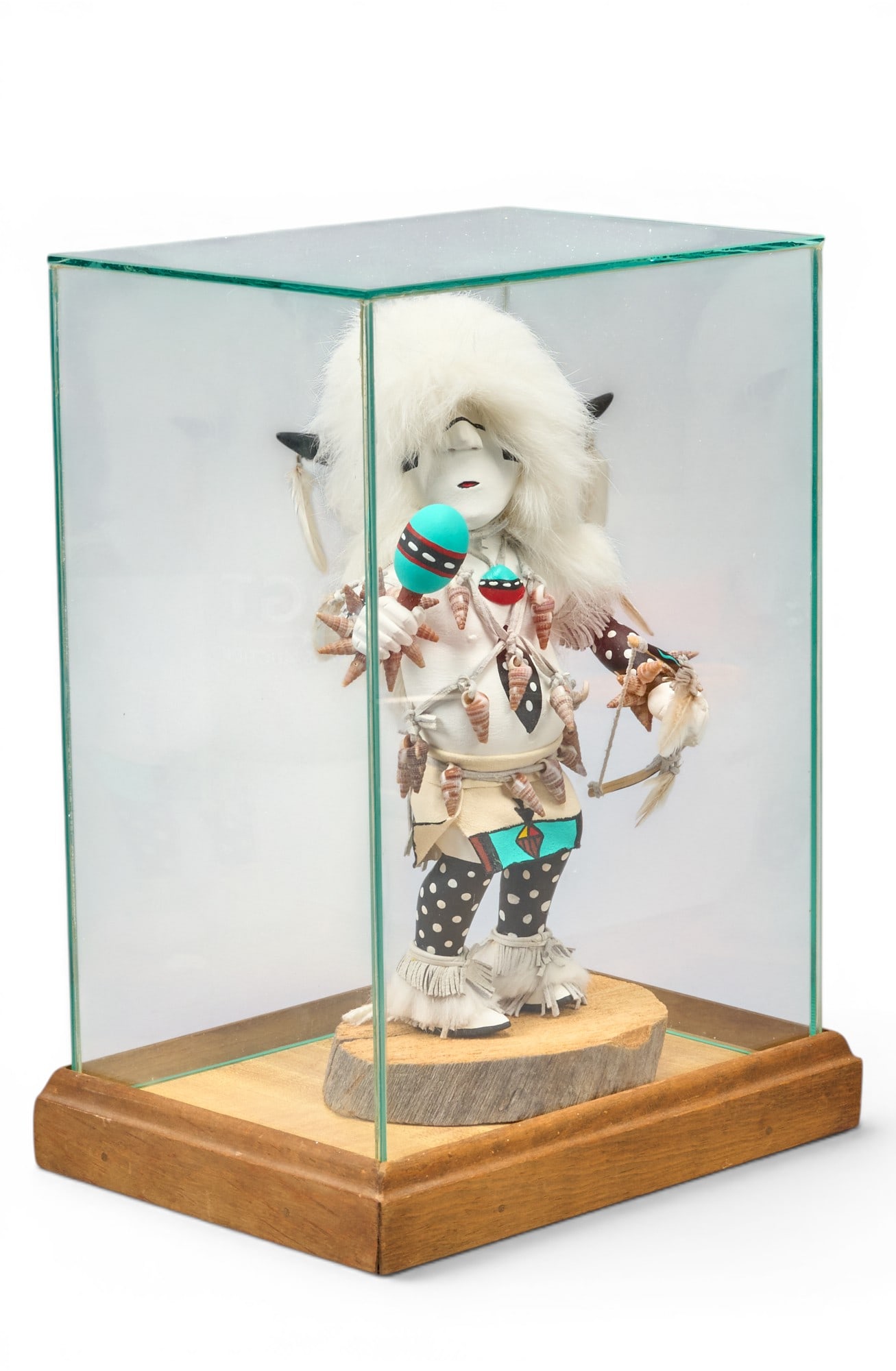 L. Hubbs "White Buffalo" Kachina Figure: L. Hubbs "White Buffalo" wood painted Kachina figure in display case height: 12 in. x width 8 in. x depth 6 in. Provenance: Property from a home in San Antonio, Texas 
