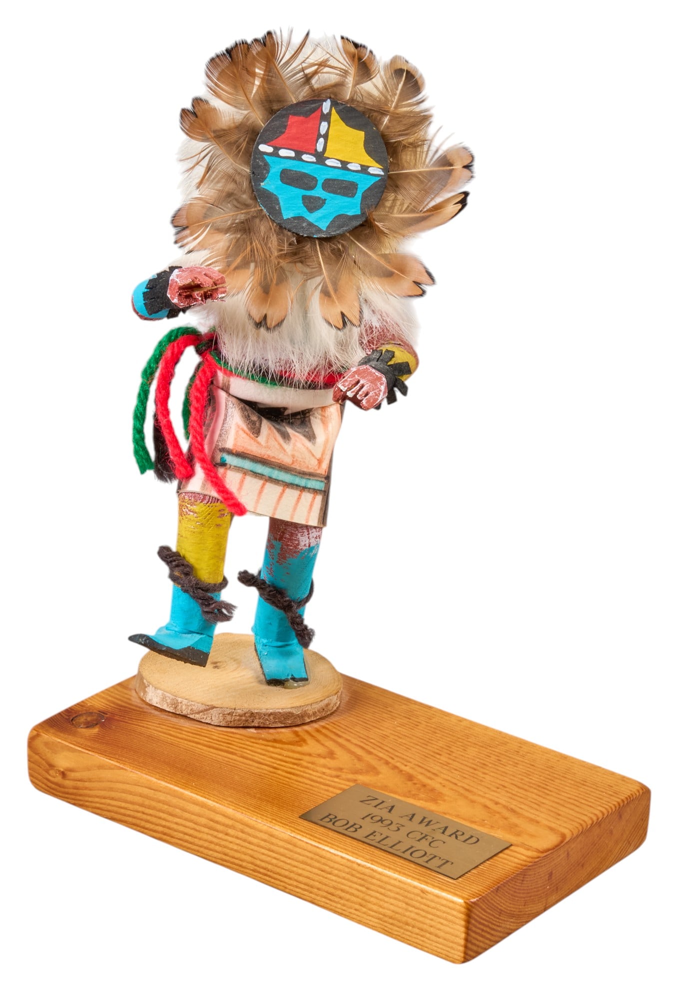 Zia Award Kachina Figure: 1993 Zia award painted wood Kachina figure height 9 in. x width 6 in. x depth 3.5 in. Provenance: Property from a home in San Antonio, Texas 