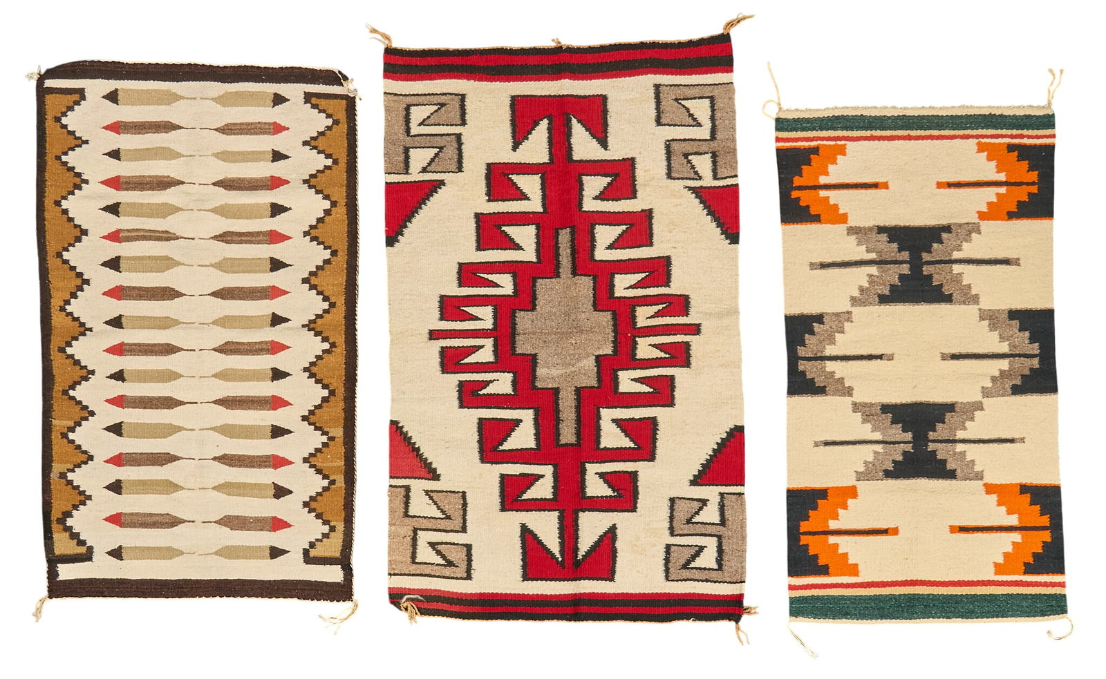 (3) Handwoven Navajo Textiles: (3) Handwoven Navajo textiles of various sizes and styles 3 ft. 8 in. x 2 ft. 3 in. / largest Provenance: Property from a home in San Antonio, Texas 