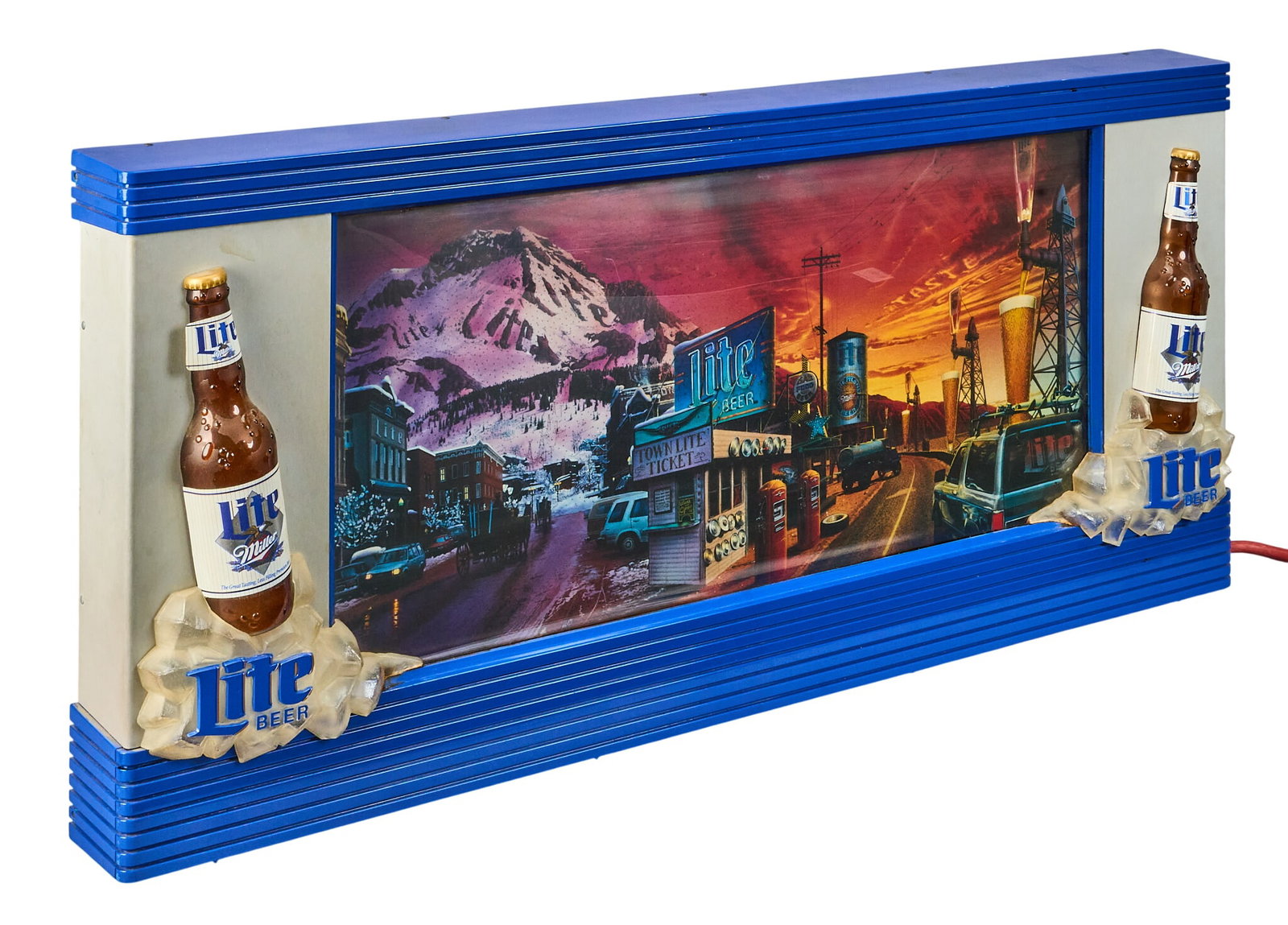 Miller Lite Panoramic Lighted Beer Sign: Miller Lite panoramic lighted beer sign, in working condition, lights up and image scrolls height 17.5 in. x width 39 in. x depth 4 in. Provenance: Property from the collection of Linda Muth,