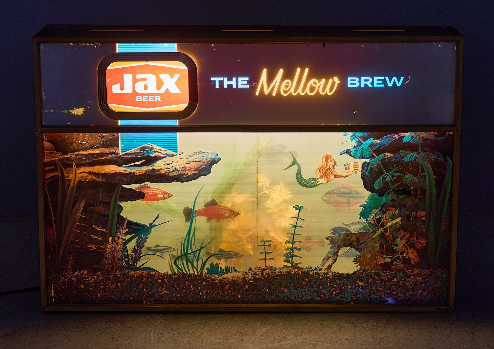 Jax Beer Mellow Brew Lighted Motion Sign, 1960s: Jax Beer The Mellow Brew sign, lighted motion aquarium design with moving fish and mermaid, circa 1960s, in working condition height 15.5 in. x width 22.5 in. x depth 5 in.