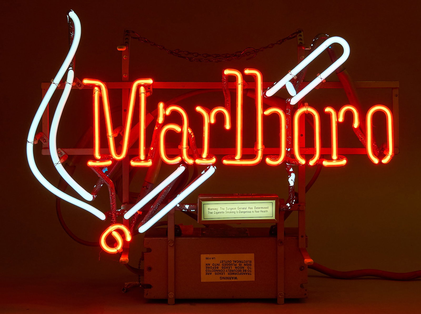 Marlboro Neon Sign: Vintage Marlboro cigarettes neon sign, circa late 20th century, in working condition height 16 in. x width 20 in. x depth 6 in. Provenance: Property from a New Braunfels, Texas collector of vint