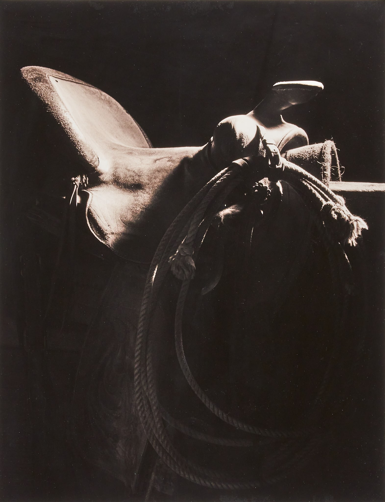 Gregg Albracht, Saddle Photograph: Gregory "Gregg" Albracht (New Mexico, b. 20th C.), saddle photograph, signed and numbered in the margins, 81/100 sight: 13.5 x 18 in., frame: 27.5 x 33 in. Provenance: Property from a ranch