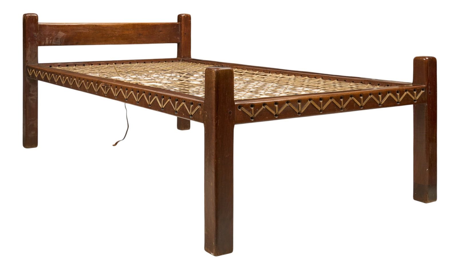 Ranch Style Twin Bedframe: Ranch style twin-size bedframe with woven hide chord mattress support height 31 in. x width 43 in. x depth 80 in. Provenance: Property from the personal law library of former King Ranch General