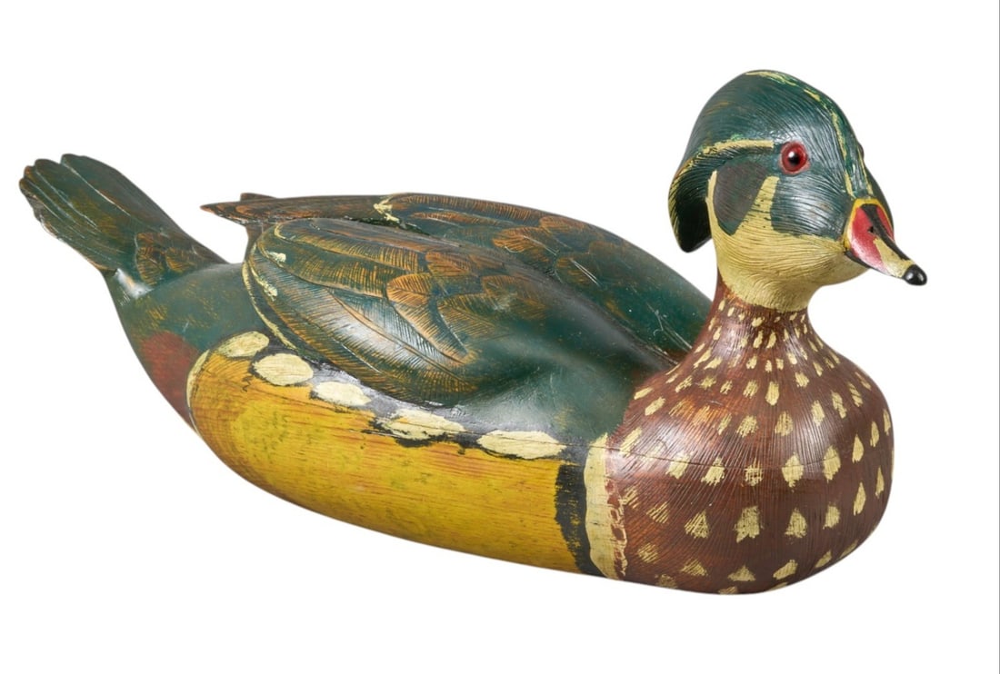 Wooden Duck Decoy: Hand painted wooden duck decoy height 6.5 in. x width 13.5 in. x depth 3.5 in. Provenance: Property from a home in San Antonio, Texas 