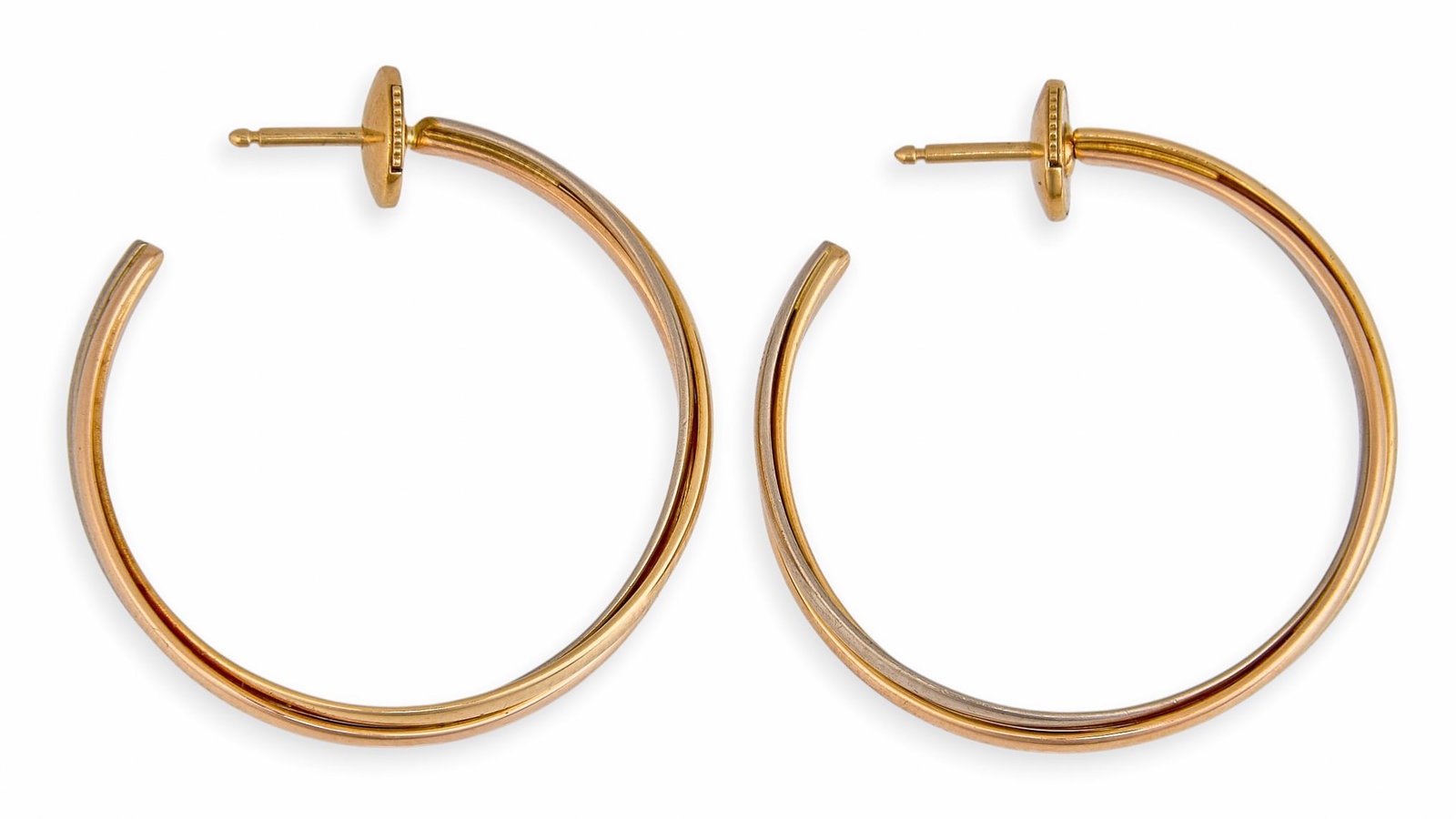 Cartier Trinity Hoop Earrings: Cartier 18K Trinity three-tone hoop earrings, in white, yellow, and rose gold, marked "750 Cartier" Size: 1.25 in. diameter Total weight: 10.7 g Provenance: Property from a home in San Anton