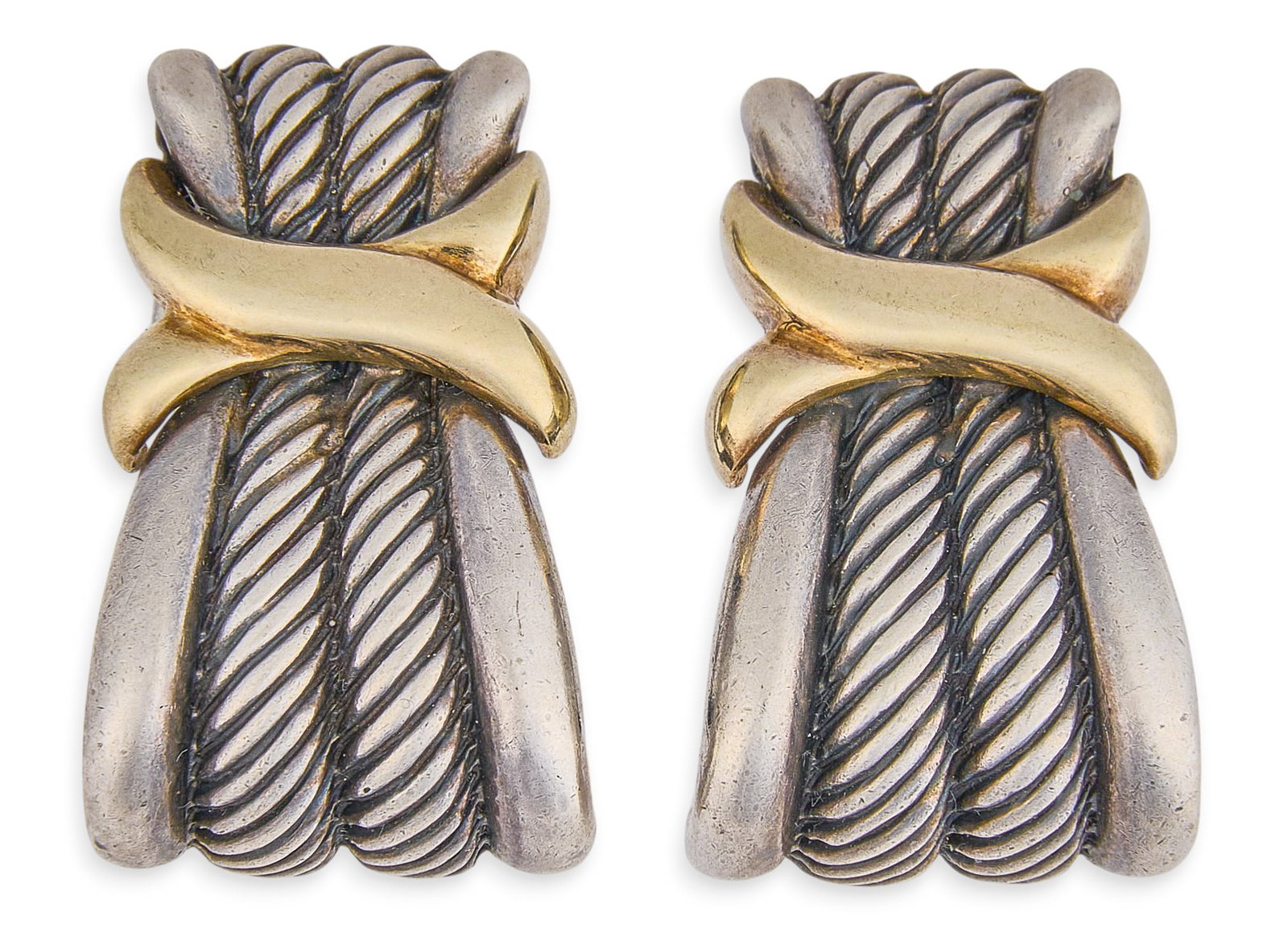 David Yurman 14K/Sterling Silver Earrings: Pair of David Yurman sterling silver clip-on earrings, with 14K yellow gold details, marked "D. YURMAN 925 14K" Length: 1 in. Total weight: 13.9 g Provenance: Property from the Terrell