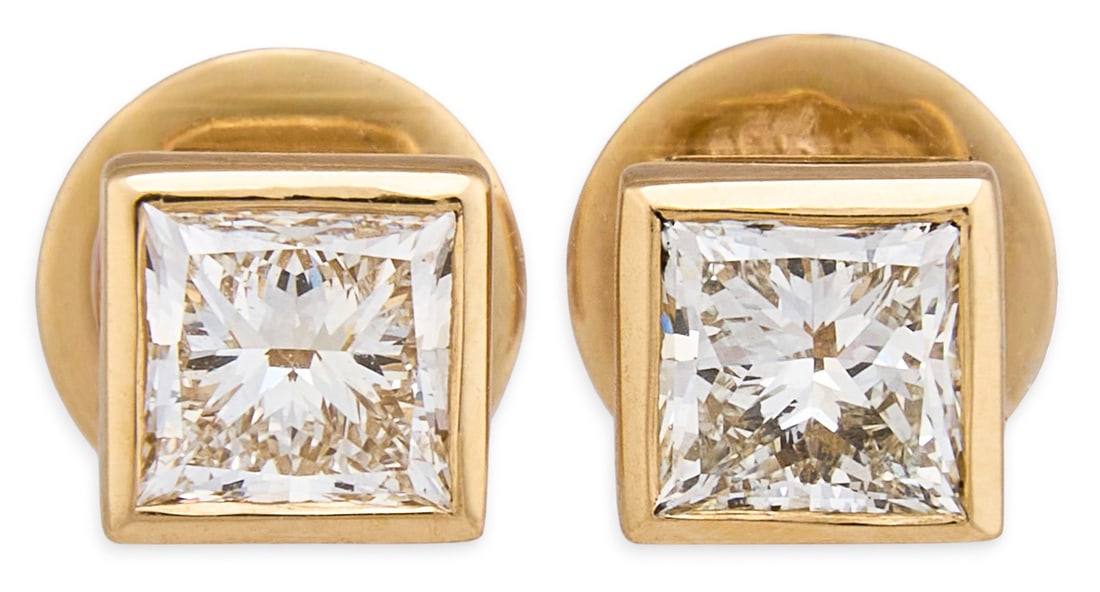 18K Diamond Stud Earrings: Pair of 18K yellow gold stud earrings set with two square modified brilliant cut diamonds weighing 0.5 ct each, graded J color and VVS2/VS1 clarity, each accompanied by a GIA dossier and