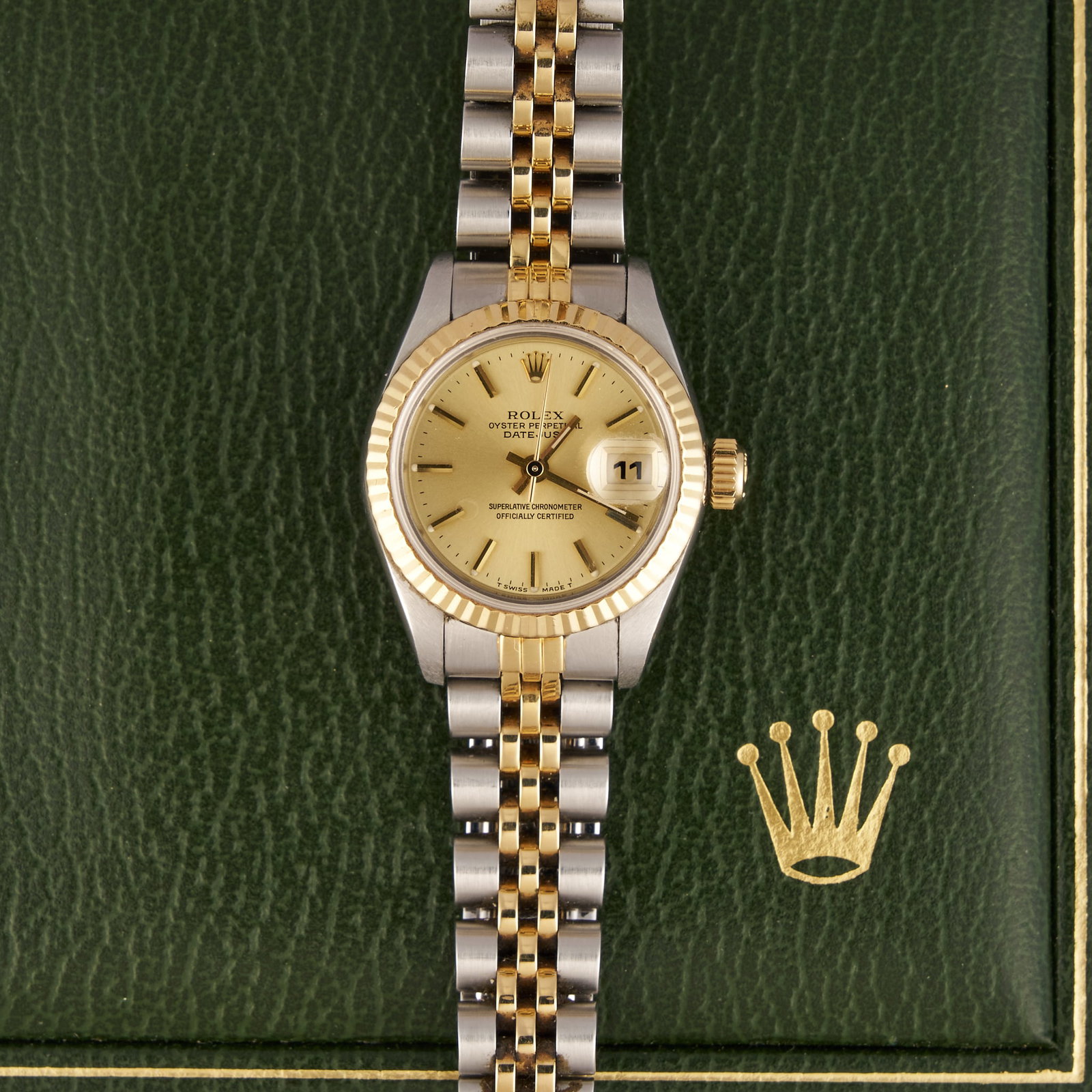 Ladies Rolex Datejust 26mm Two-Tone: Ladies Rolex Datejust Oyster Perpetual 18K yellow gold and stainless steel, circa 1986, model number 69173, serial number 9299826, 26mm case, features gold fluted bezel, quickset date, includes o