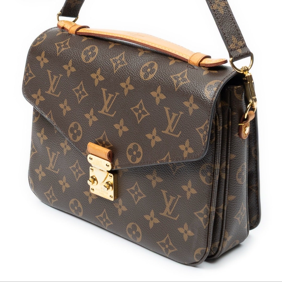 Louis Vuitton Pochette Metis Shoulder Bag: Louis Vuitton Pochette Metis shoulder bag in brown monogram canvas, golden brass hardware, marked FO1199 (19th week of 2019), includes strap; third-party authenticated 9.75 in. x 7.75 in. x 3.25 in.