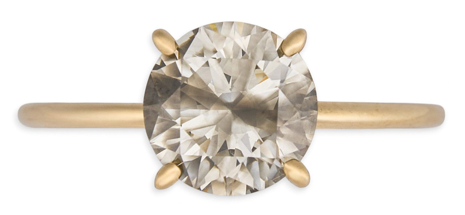 1.5 ct Fancy Light Brown Diamond Solitaire Ring: 14K yellow gold solitaire ring set with a round brilliant cut diamond weighing approximately 1.55 ct, graded fancy light brown color and SI clarity with IGI report (no. 33J4770226), marked "14K&q