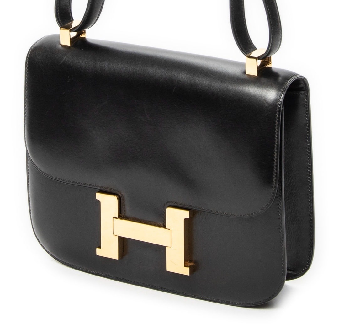 Hermès Constance 23 Shoulder Bag: Hermès Constance 23 shoulder bag in black Box leather, gold hardware, marked Stamp E in Circle (1975); third-party authenticated 9 in. x 6.75 in. x 2 in. Condition A; excellent condition,