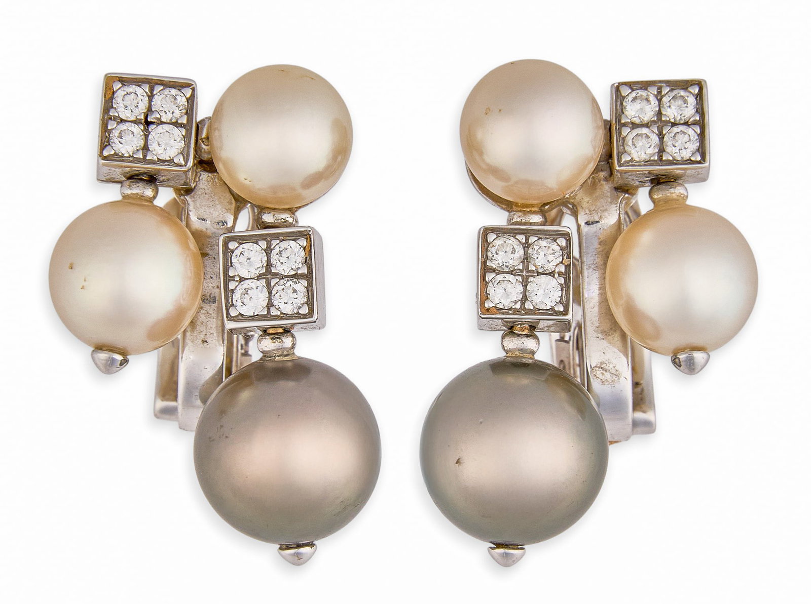 Bvlgari 18K Lucea Pearl & Diamond Earrings: Bvlgari 18K white gold dangle earrings, set with pearls graduating from 7 mm to 9.3 mm, and pave set diamonds, marked "BVLGARI 750", includes original box Total weight: 14.1 g Provenance: Pr