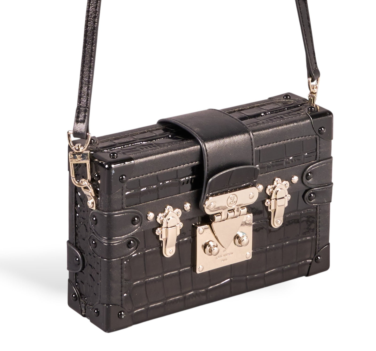 Louis Vuitton Petite Malle Bag: Louis Vuitton Petite Malle bag in black crocodile print leather, with silver-tone hardware. includes shoulder strap 7.5 in. x 5 in. x 2 in. Condition A - excellent condition, shows