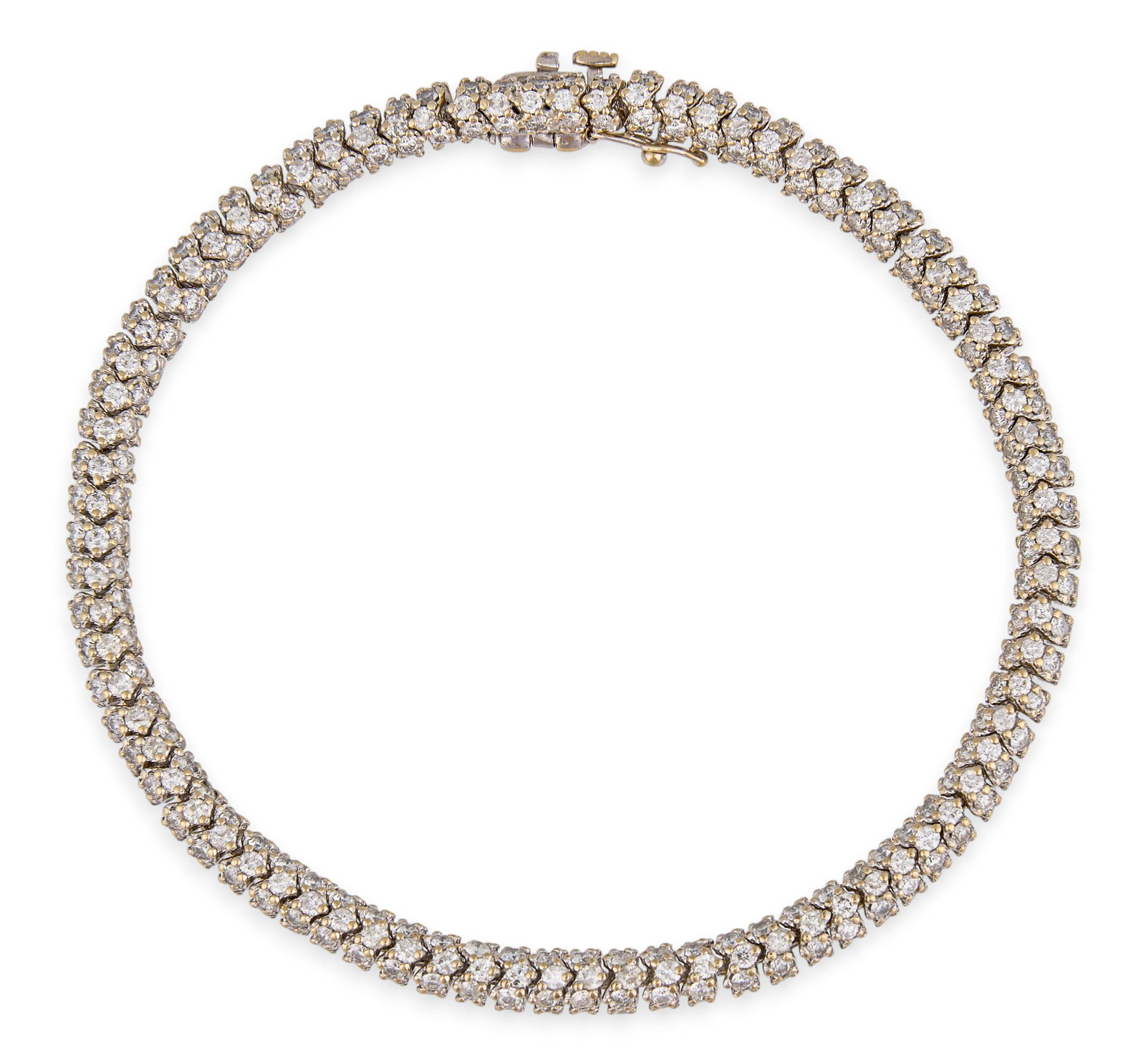 7ctw Diamond Tennis Bracelet: 14K white gold tennis bracelet set with round brilliant cut diamonds, approximately 7.25 ctw, graded H–J color and I1–I2 clarity, marked "14K" to box clasp Length: 7.75 in. Total