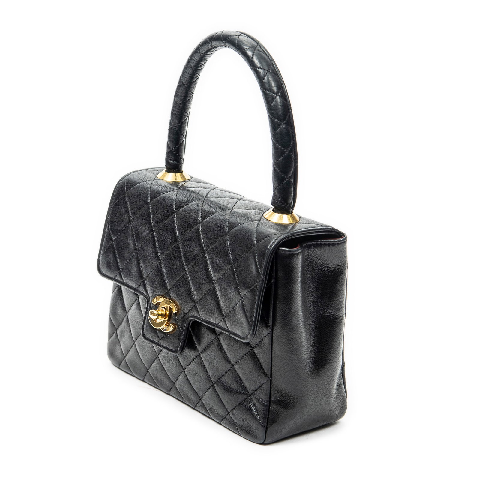 Chanel Vintage Top Handle Square Flap Handbag: Chanel Vintage Top Handle Square Flap handbag in black quilted lambskin leather, gold hardware, marked 1901262 (1989-1991); third-party authenticated 7.75 in. x 5.5 in. x 3 in. Condition A; excellent