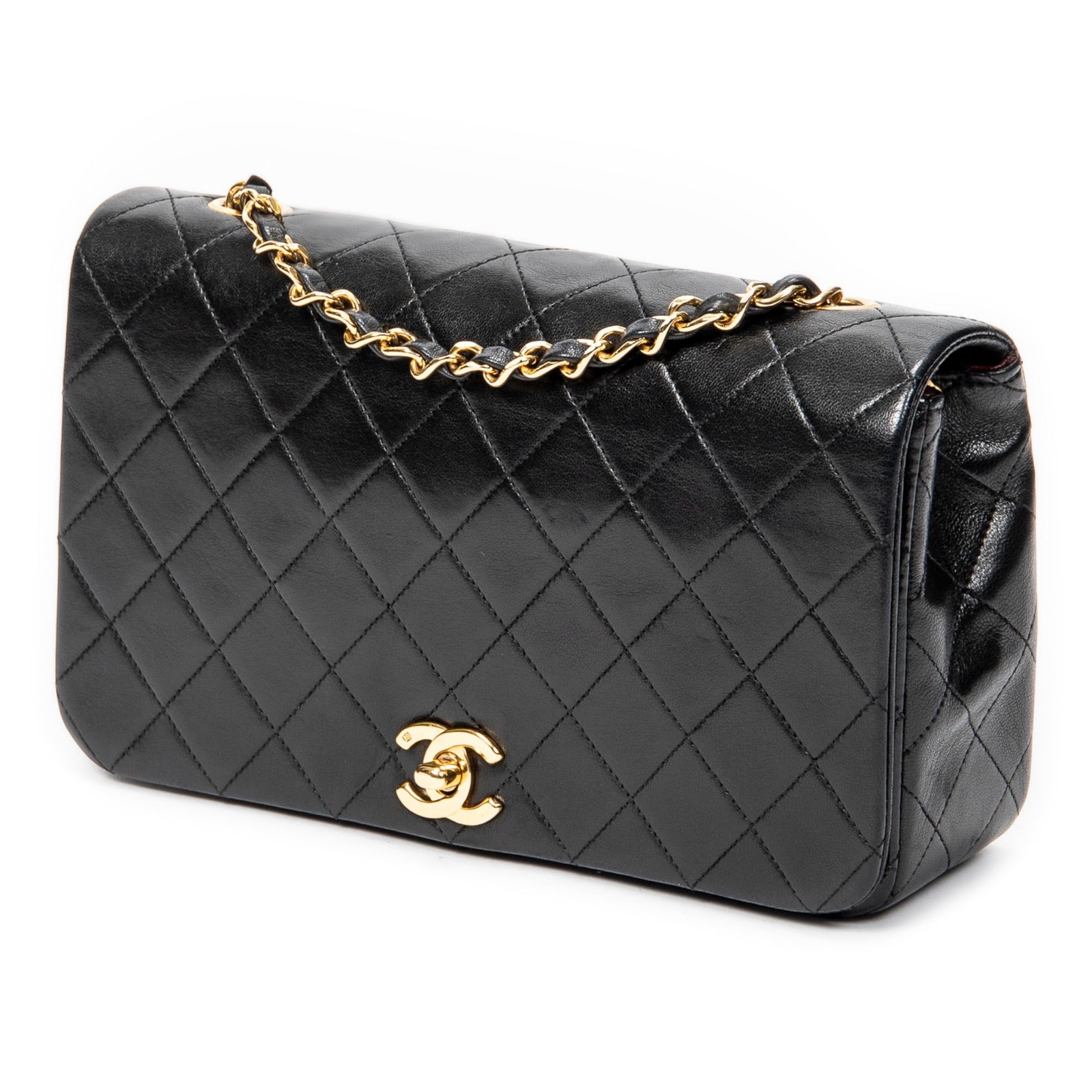 Chanel CC Push Lock Mademoiselle Full Flap Shoulder Bag: Chanel CC Push Lock Mademoiselle Full Flap shoulder bag in black quilted lambskin leather, with interlaced chain, and golden hardware, marked 1375323 (1989-1991), includes sticker; third-party authent