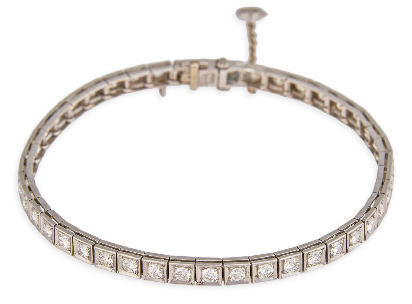 3 ctw Platinum Diamond Tennis Bracelet: Platinum diamond tennis bracelet set with round brilliant cut diamonds, approximately 3.1 ctw, marked ".90 PLAT" Length: 7 in. Total weight: 14.2 g Provenance: Property from a home in