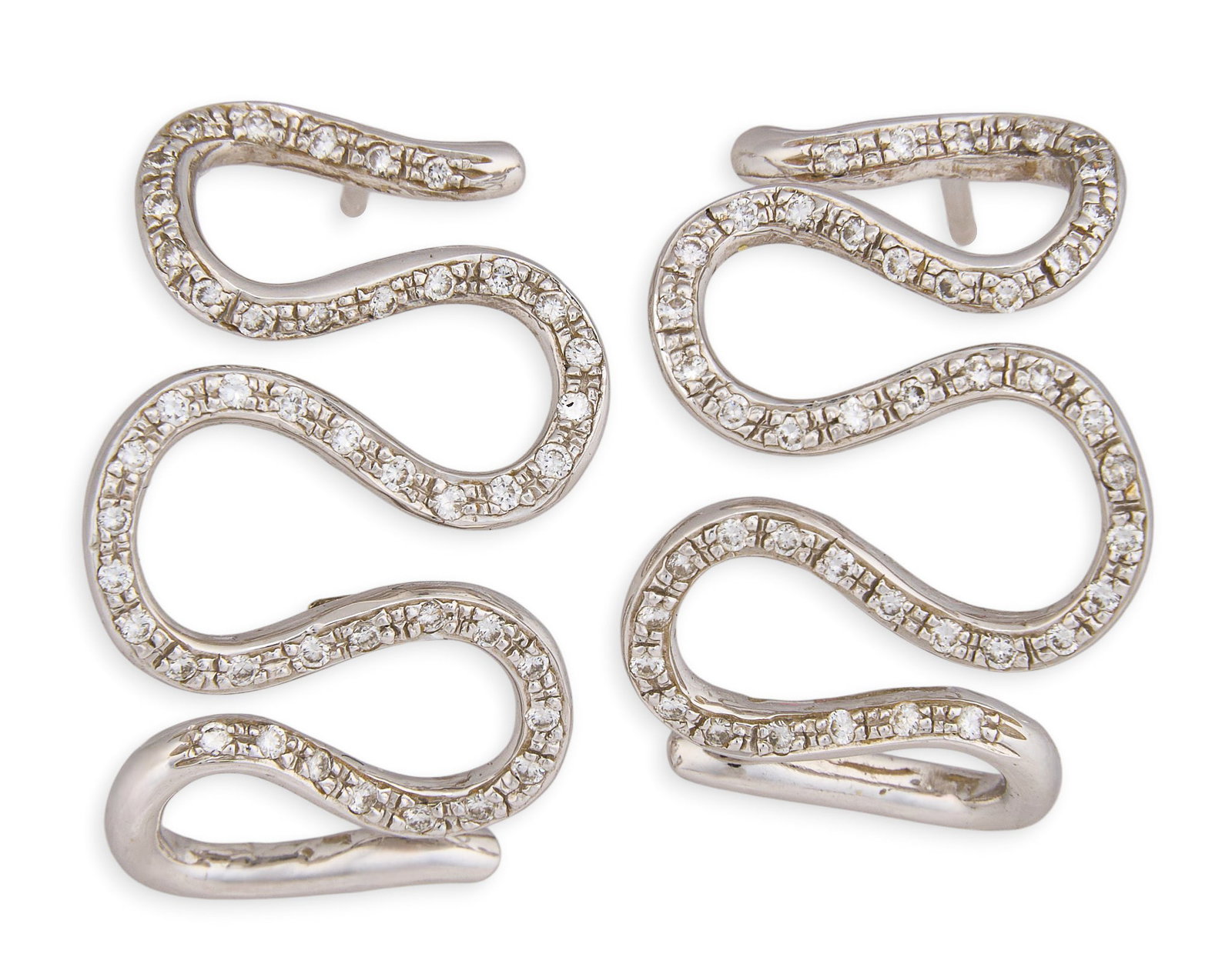 Salavetti 18K Diamond Snake Earrings: Salavetti 18K white gold snake form earrings, set with round brilliant cut diamonds, marked "Salavetti 750" Length: 1 in. Total weight: 8.3 g Provenance: Property from a home in San