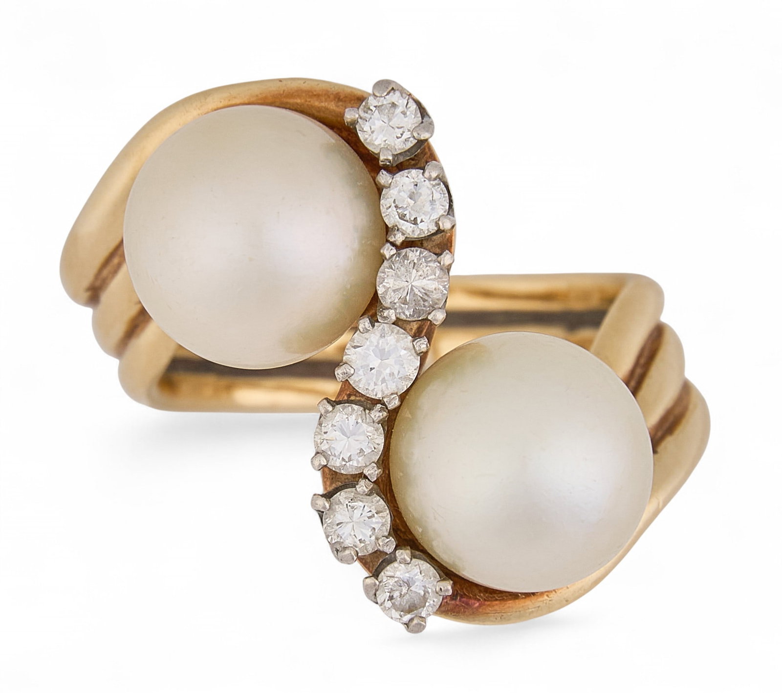 14K Pearl & Diamond Ring: 14K yellow gold ring set with two round pearls measuring approximately __ mm each, accented by seven round brilliant cut diamonds totaling __ ctw, on a bypass fluted shank, marked "