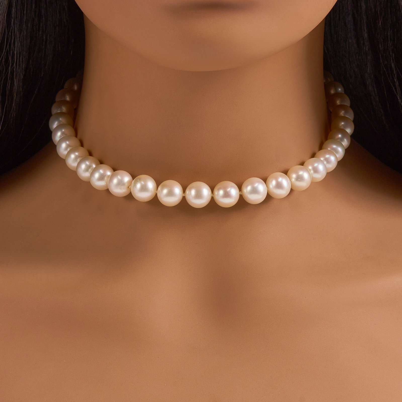10mm Akoya Pearl Necklace: One strung & knotted single strand cultured Akoya pearl necklace with an invisible 18K white gold notched clasp, featuring thirty nine cultured Akoya pearls that range from 9.2