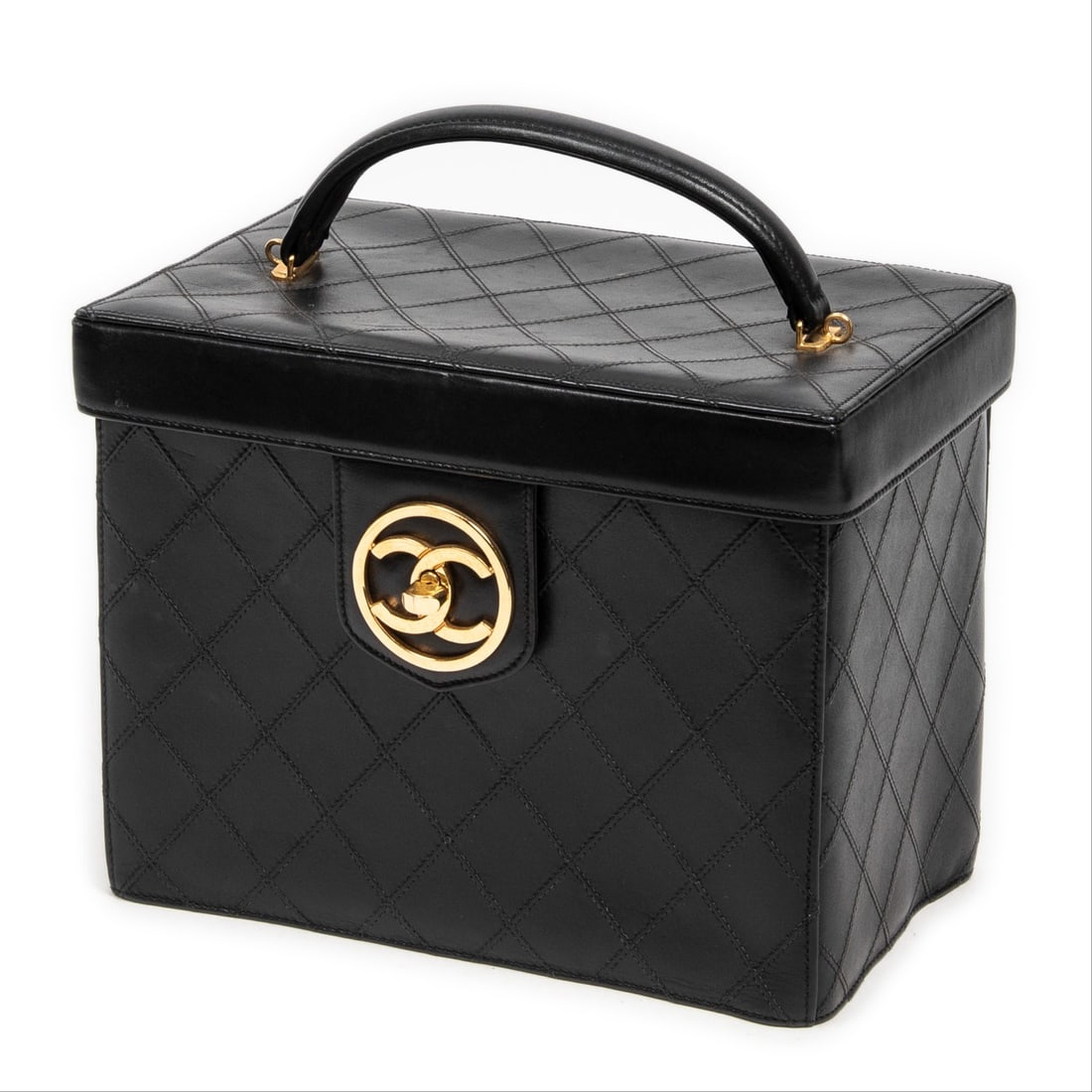 Chanel CC Logo Vanity Bag: Chanel CC Logo Vanity Bag in black quilted double stitching lambskin leather, gold hardware, marked 2550656 (1991-1994), includes sticker, card, dustbag, strap; third-party authenticated 9 in. x 7.25 