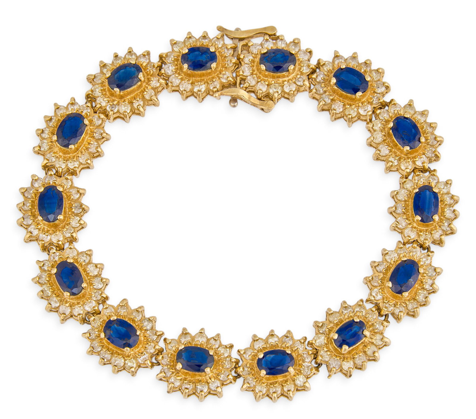14K Sapphire & Diamond Bracelet: 14K yellow gold bracelet of links set with oval cut sapphire center stone, accented by halo of round brilliant cut diamonds, marked "14K" Length: 7 in. Total weight: 31.3 g Provenance:
