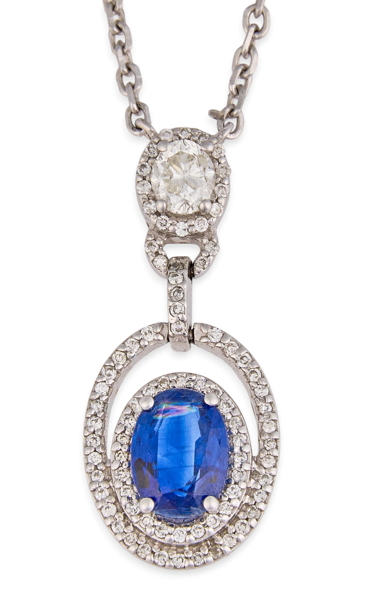14K Diamond & Sapphire Necklace: 14K white gold necklace set with oval cut sapphire, accented by double halo of round brilliant cut diamonds, with additional oval cut diamond and halo of round brilliant cut diamonds, marked "14K