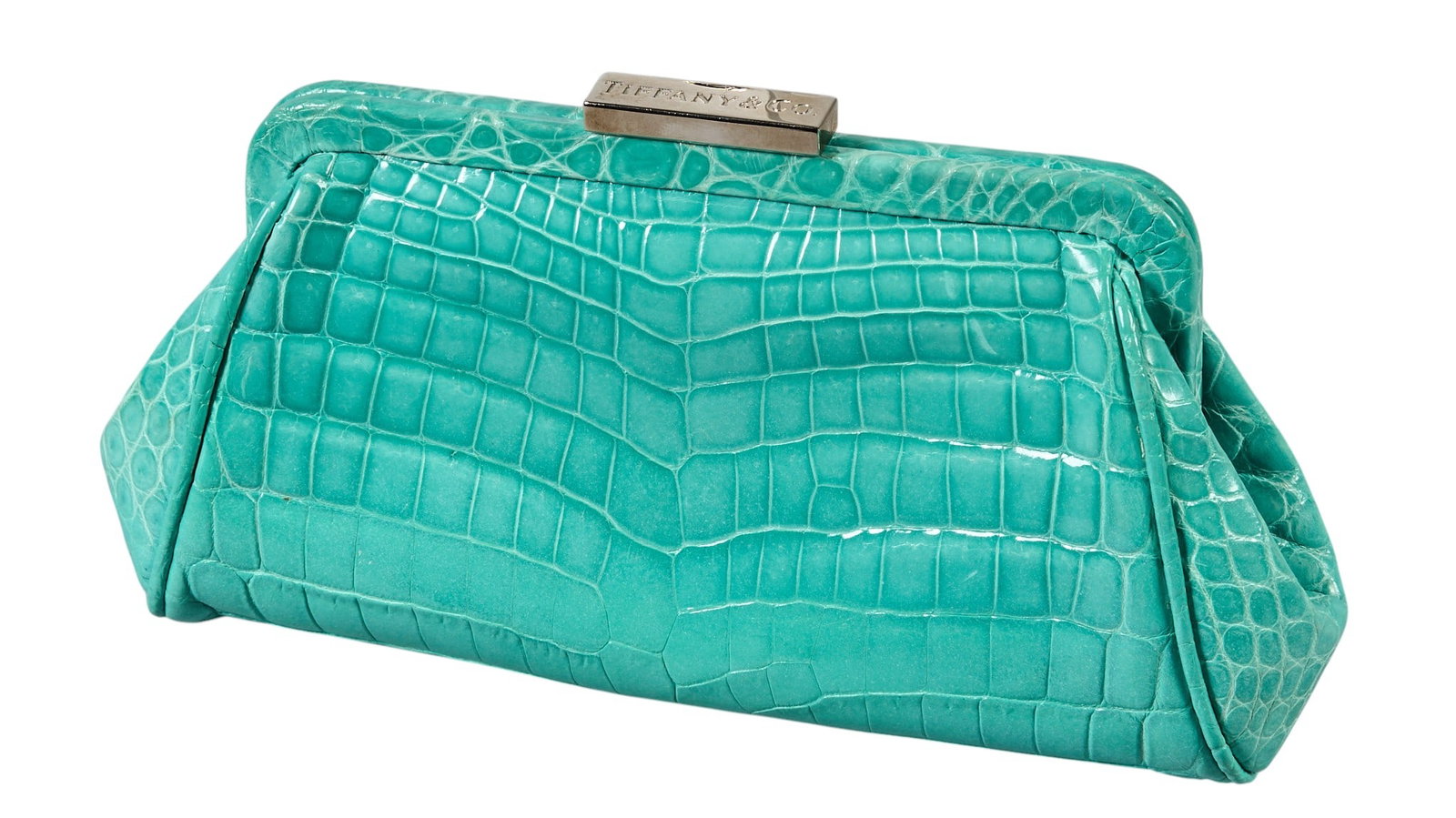 Rare Tiffany & Co. Morgan Crocodile Clutch: Tiffany and Co. Morgan clutch handbag in Tiffany blue crocodile leather and silver hardware, includes card and dustbag 8.5 in. x 4.5 in. x 2 in. Condition A; excellent condition, shows lit