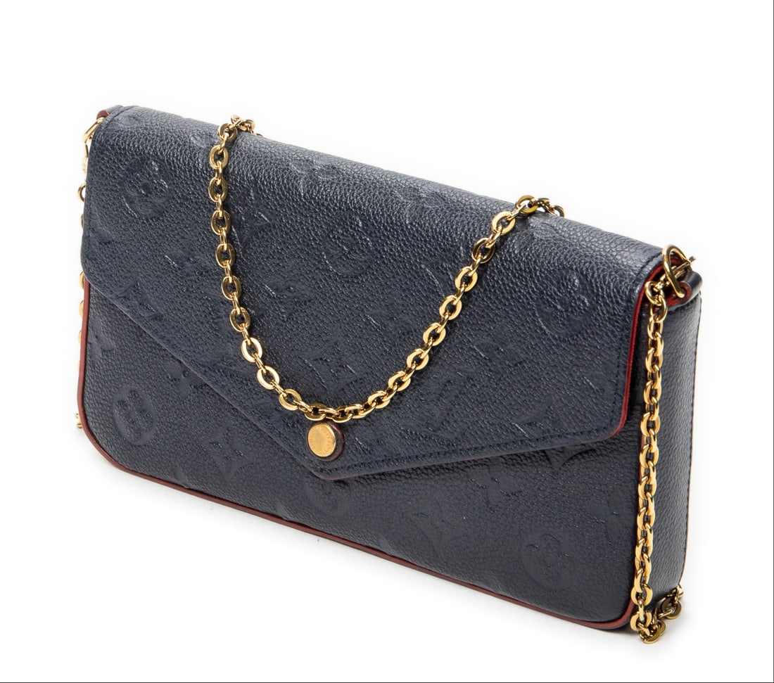 Louis Vuitton Pochette Felicie Shoulder Bag: Louis Vuitton Pochette Felicie shoulder bag in navy monogram empreinte, gold chain strap, golden brass hardware, marked SP4118 (41st Week of 2018), includes chain strap and two pouches; third-party au