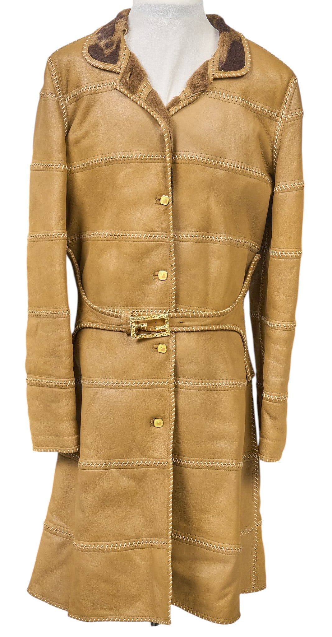 Vintage Fendi Leather & Shearling Coat: Vintage Fendi leather and shearling coat, with four button closure and waist tie length from top of collar: 36 in. shoulder width: 16 in. sleeve length: 24 in. Provenance: Prop