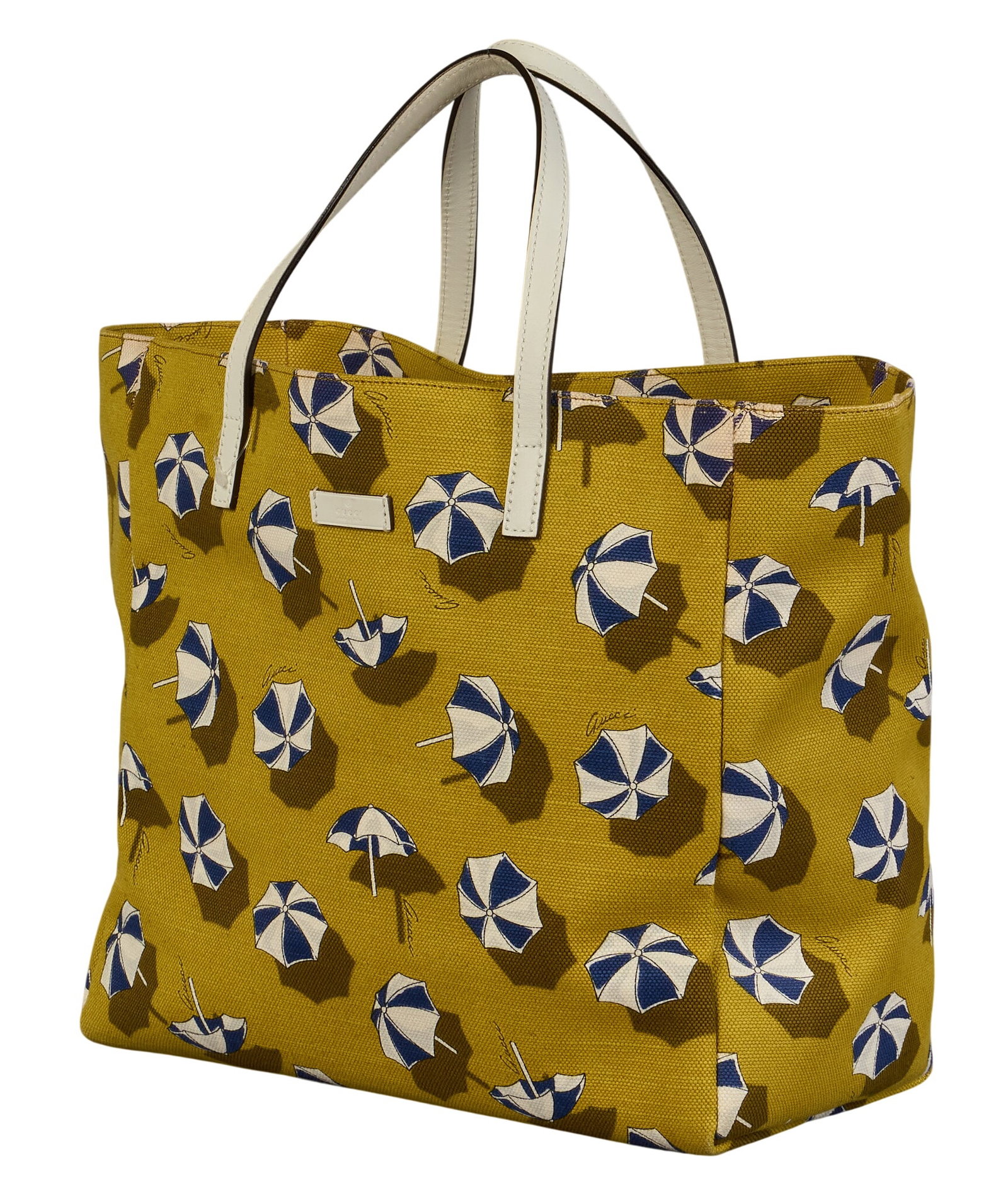 Gucci Parasol Canvas Tote Bag: Gucci tote bag in avocado green canvas with parasol print, and white leather handles, marked 282439 502752 18 in. x 11 in. x 6 in. Condition A - excellent condition, shows little signs of wear&n