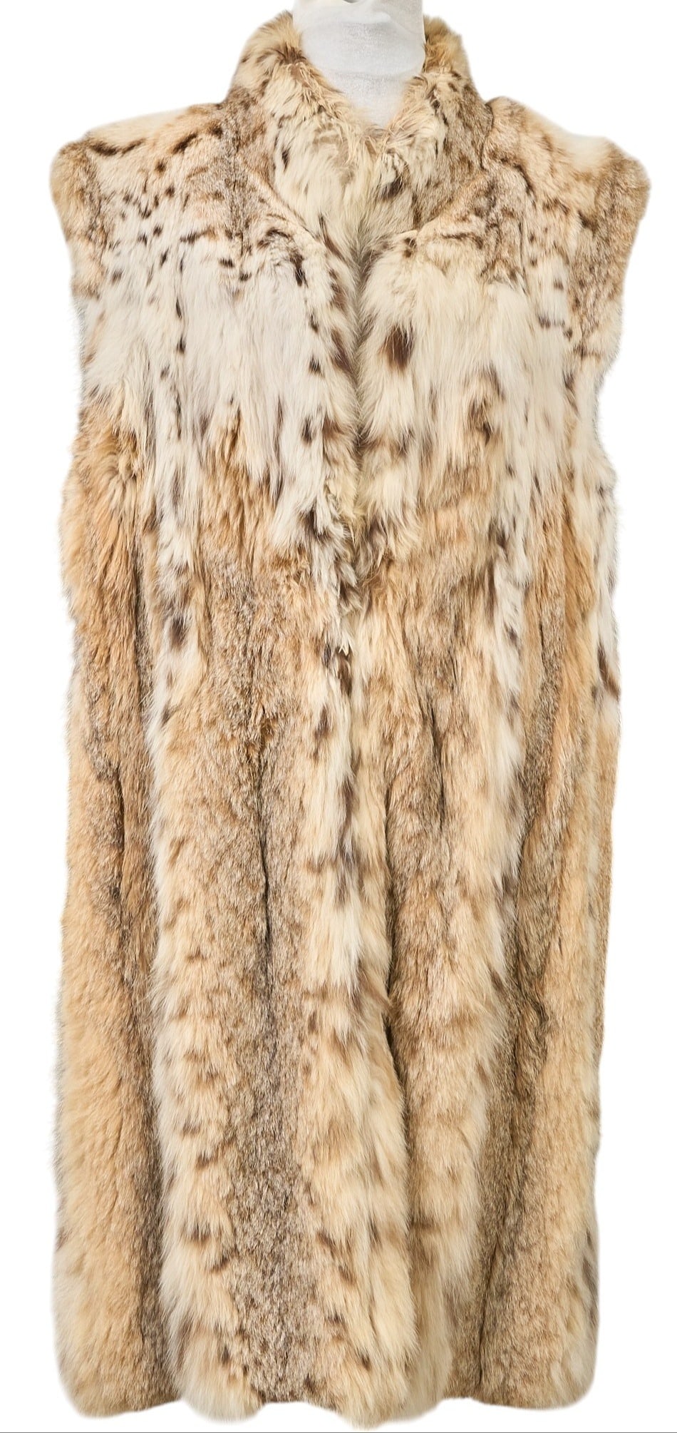Lynx Fur Coat: Sleeveless lynx fur coat with full lining length from top of collar: 41 in. shoulder width: 19 in. Provenance: Property from a home in San Antonio, Texas 