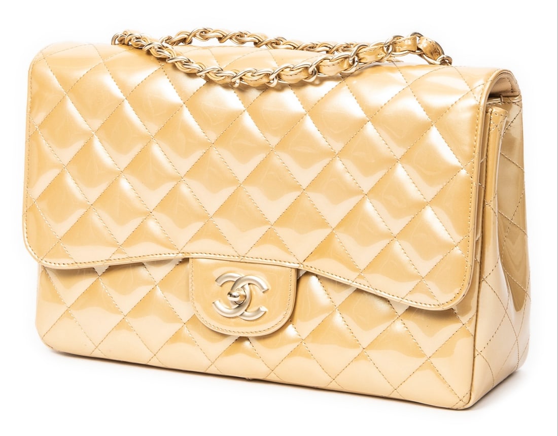 Chanel Classic Jumbo Single Flap Shoulder Bag: Chanel Classic Jumbo Single Flap shoulder bag in gold quilted patent leather, gold hardware, marked 13532462 (2009-2010), includes sticker, card; third-party authenticated 11.5 in. x 7.75 in. x 2.25 i