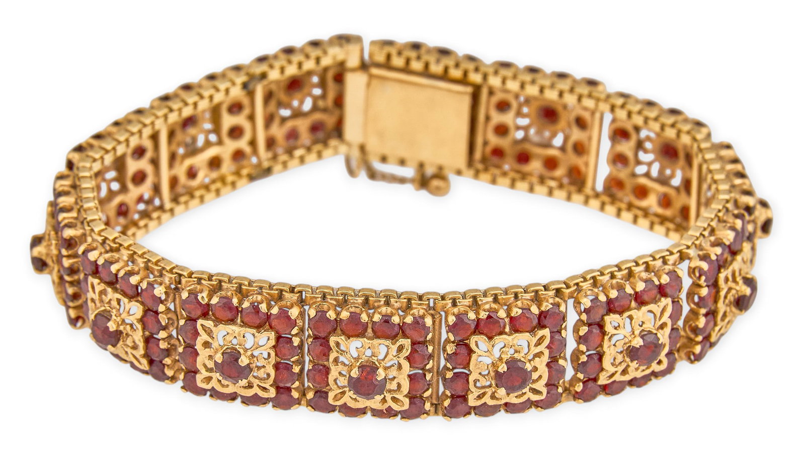 18K Garnet Bracelet: 18K yellow gold bracelet set with round brilliant cut garnet, with safety chain, marked "750" Length: 6.25 in. Total weight: 35.7 g