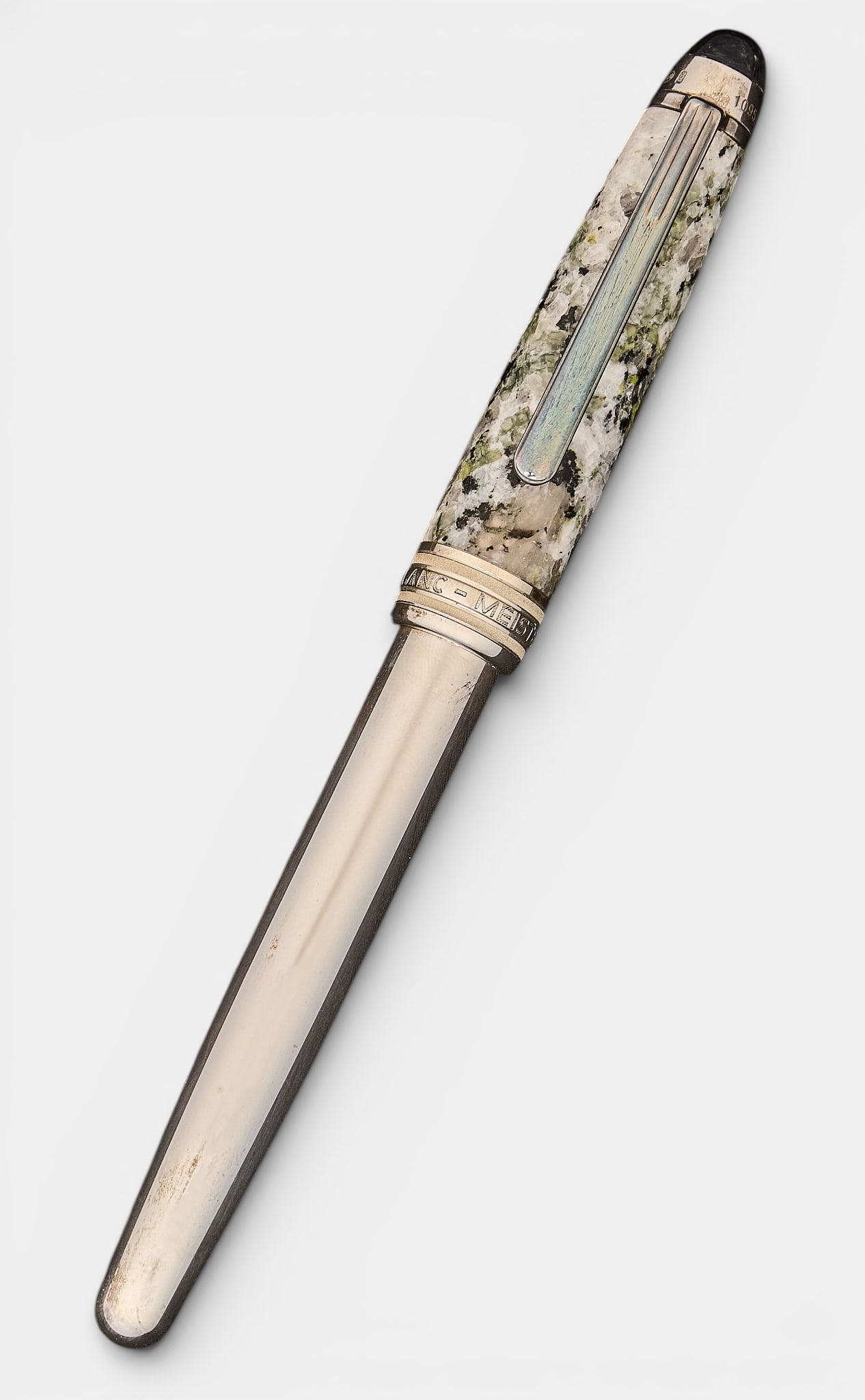 Montblanc Soulmakers for 100 Years 1906 Pen: Limited edition Montblanc Soulmakers for 100 Years 1906 ballpoint pen with sterling silver barrel and floating diamond on cap, features granite-patterned resin, edition 1095 of 1906 Provenance: P