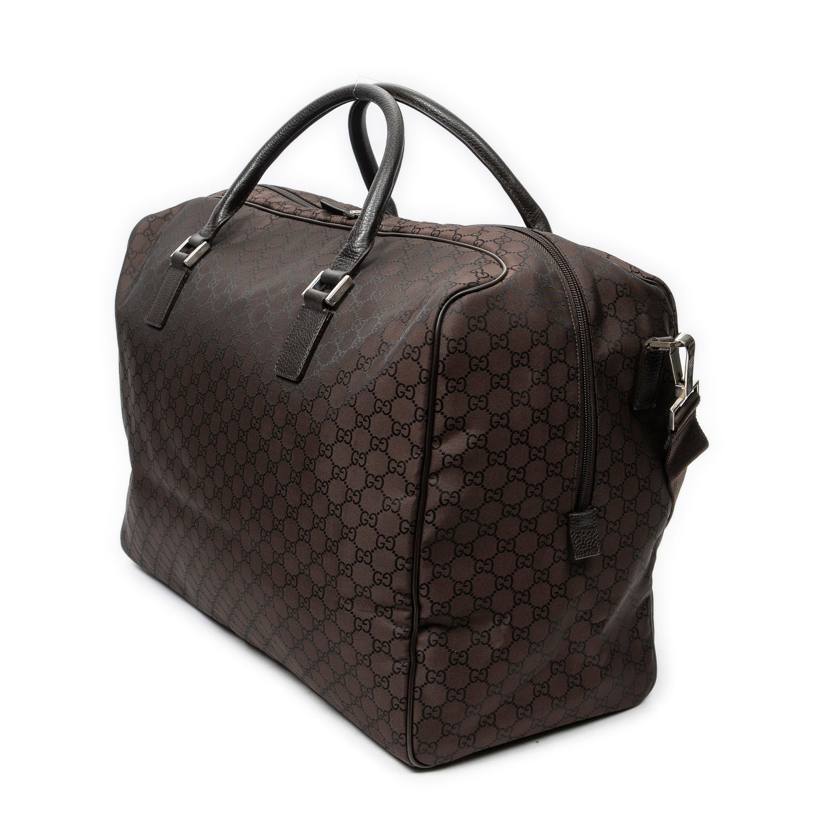 Gucci Large Carryall Duffel Bag: Gucci Large Carryall Duffel Bag in brown monogrammed nylon canvas, silver hardware, marked 190629-204046, includes strap; third-party authenticated 20 in. x 13 in. x 9 in. Condition A; excellent condi