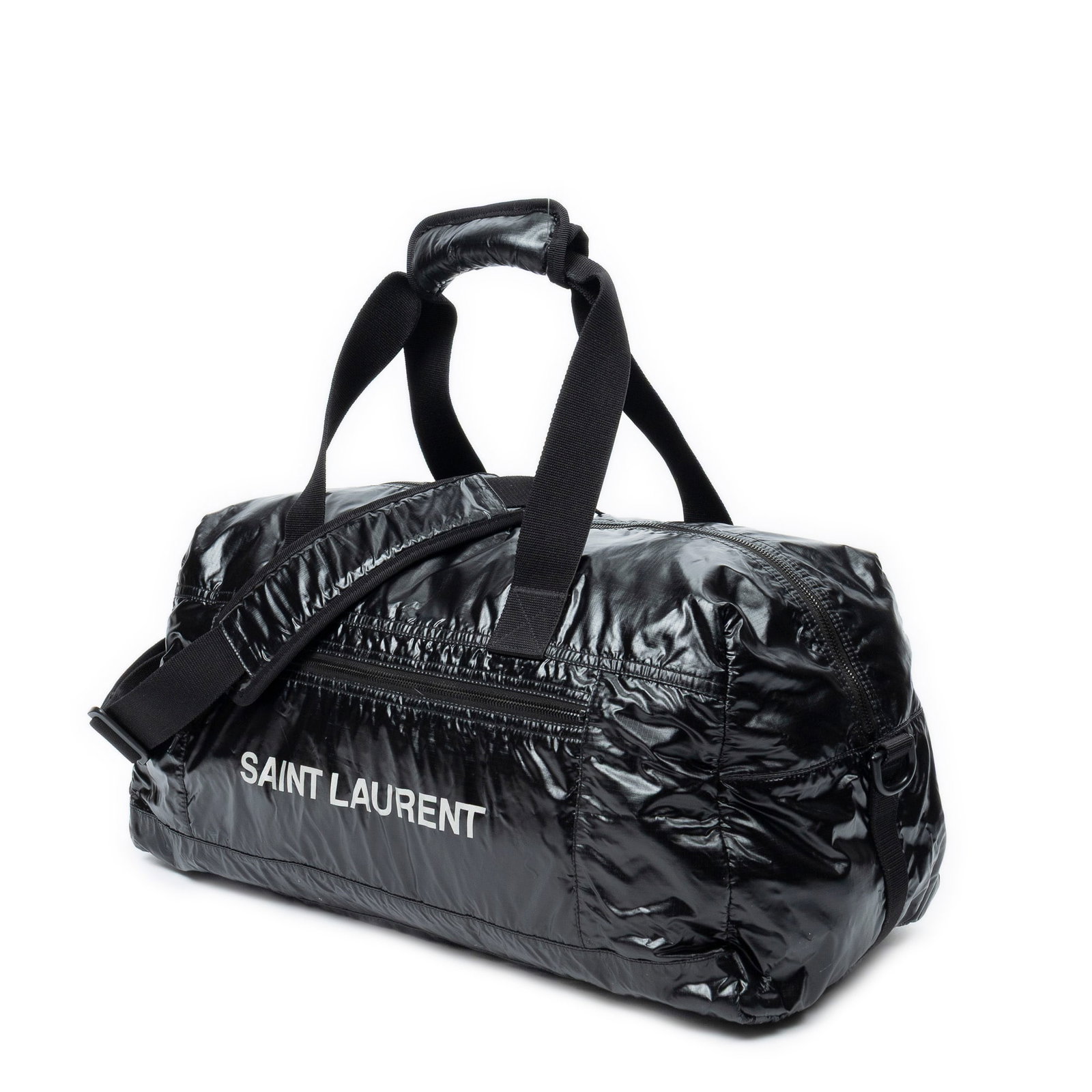 Yves Saint Laurent Nuxx Duffle Travel Bag: Yves Saint Laurent Nuxx Duffle travel bag in black nylon coated canvas, black metal hardware, marked PLB581374-0319, includes long strap; third-party authenticated 19.25 in. x 9.5 in. x 9 in. Conditio