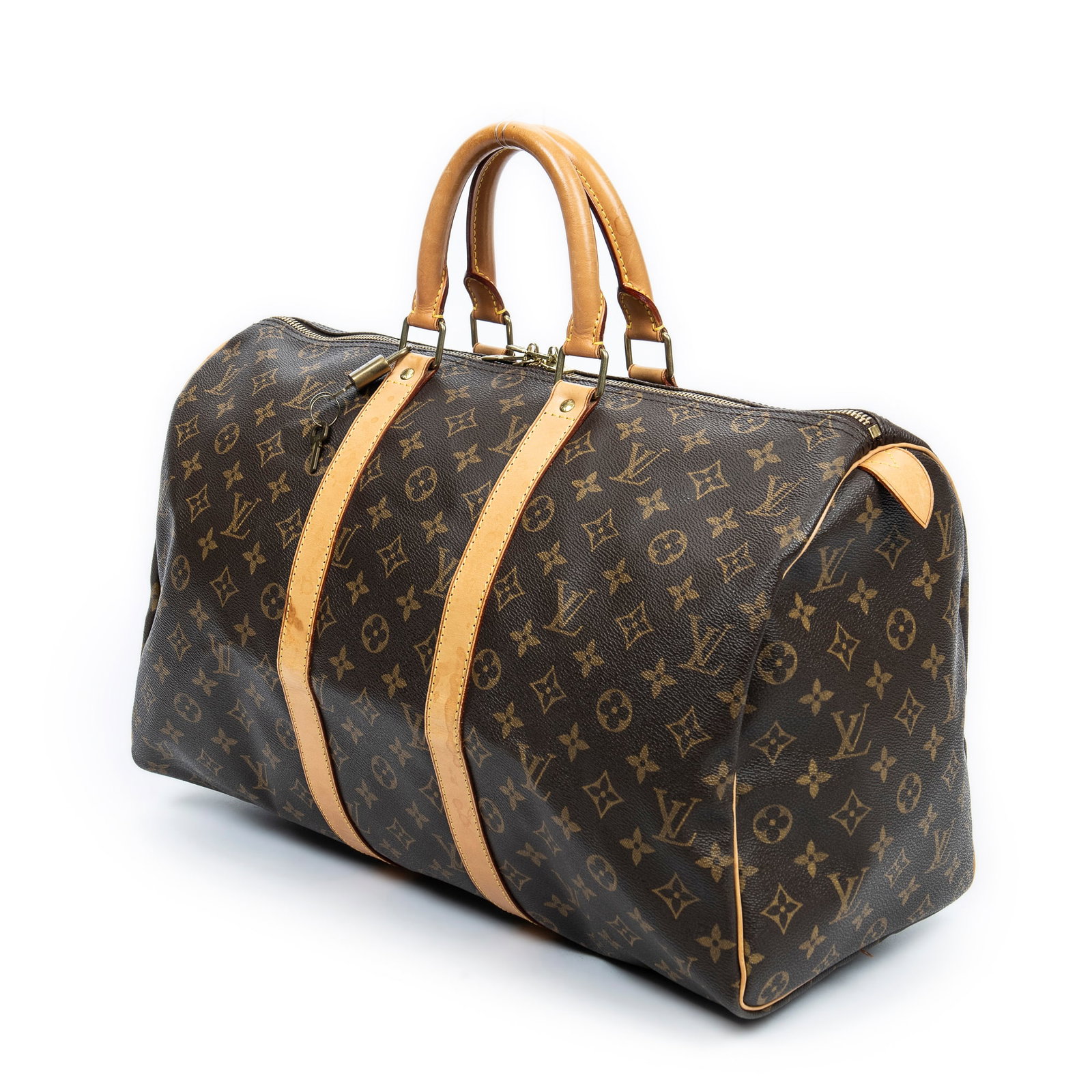 Louis Vuitton Keepall 45 Travel Bag: Louis Vuitton Keepall 45 travel bag in brown monogram canvas, vachetta handles, golden brass hardware, marked FL1002 (October 2002), includes cadenas, key(s); third-party authenticated 17.75 in. x 9.5