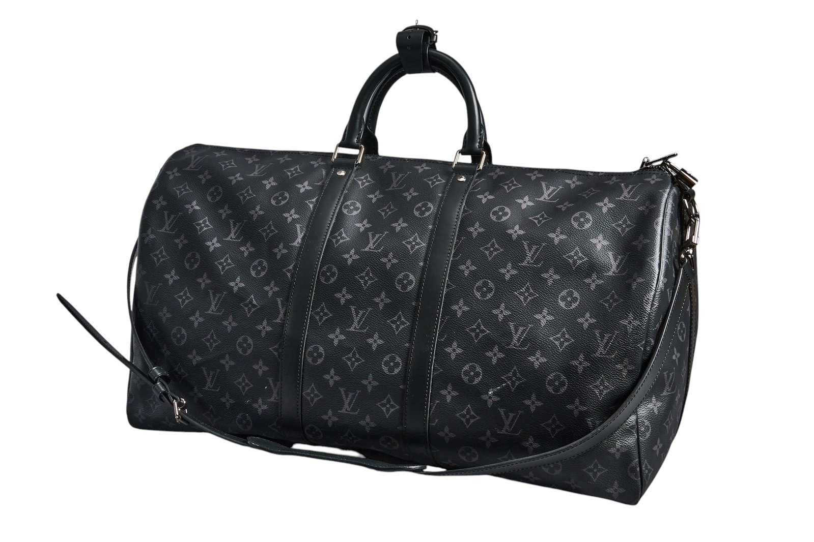 Louis Vuitton Keepall Travel Bag: Louis Vuitton Keepall travel bag of black monogram coated canvas with black leather handles and gunmetal hardware, includes black leather cross body strap, black leather strap for handles, dustbag, ke