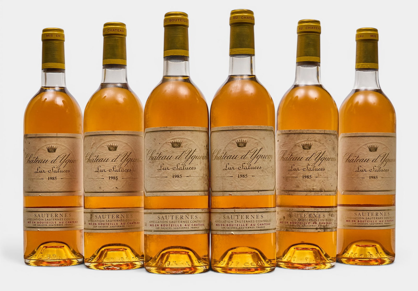 (6) 1985 Chateu d'Yquem Sauternes: Six bottles of 1985 Chateau d'Yquem Sauternes Provenance: Property from the custom chilled cellar of the Cordillera Ranch home of prominent attorney David J. Arata