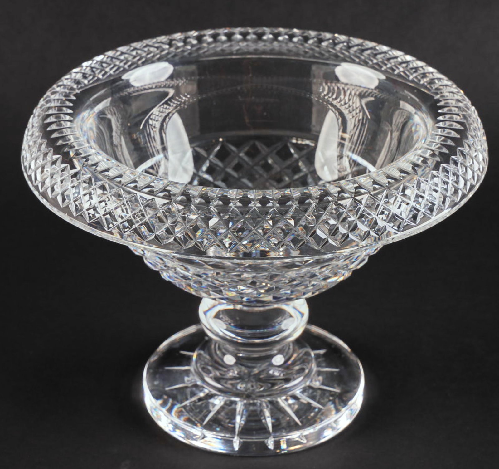 Waterford Turnover Bowl: Waterford crystal turnover bowl with rolled lip and pedestal base height 7 in. x diameter 10.5 in. Provenance: Property from a home in San Antonio, Texas