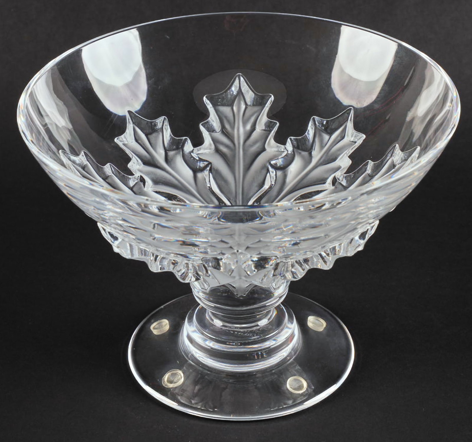 Lalique Olonne Holly Leaf Bowl: Lalique crystal bowl in Olonne Holly Leaf pattern height 7.5 in. x width 10.5 in. x depth 10.5 in. Provenance: Property from a home in San Antonio, Texas