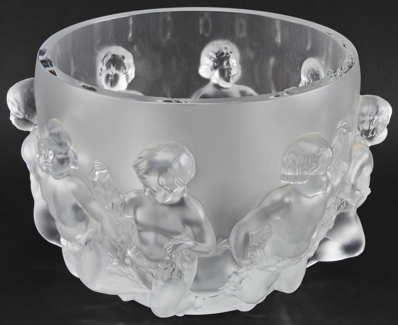 Lalique Luxembourg Bowl: Lalique "Luxembourg" crystal centerpiece bowl with cherub motifs, signed underneath height 8.5 in. x diameter 12.5 in. Provenance: Property from a home in San Antonio, Texas
